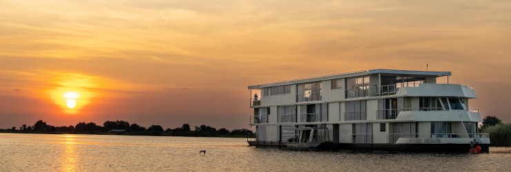 The Zambezi Queen at sunset, one of the Chobe Houseboats